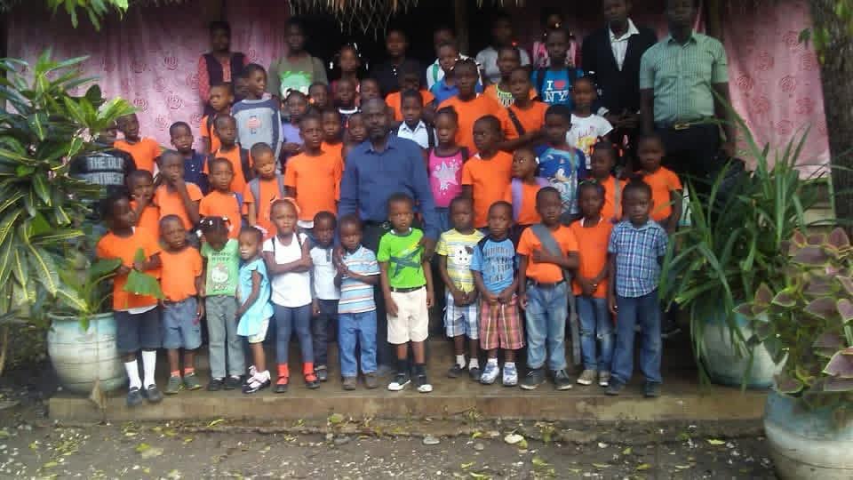 Group photo of Hope Village students and staff